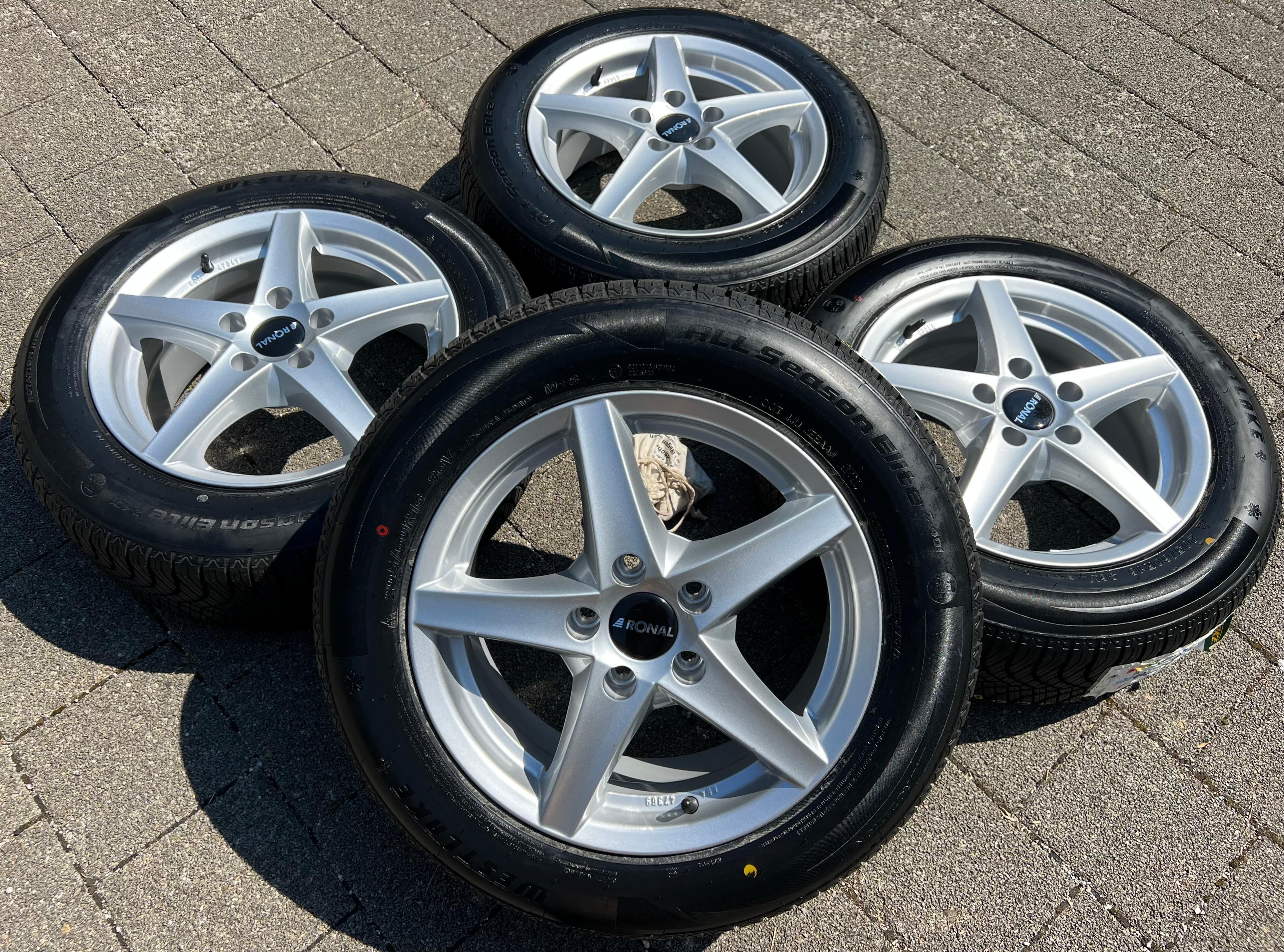 4 CERCHI IN ALLUMINIO ALL-SEASON SKODA OCTAVIA IV NX VW CADDY V SK TOURAN II 5T 205/60R16 96V CONSEGNA GRATUITA